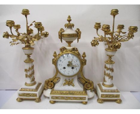 A mid to late 19th century white Carrara marble and ormolu mounted clock set with white Carrara marble and ormolu mounted, gi