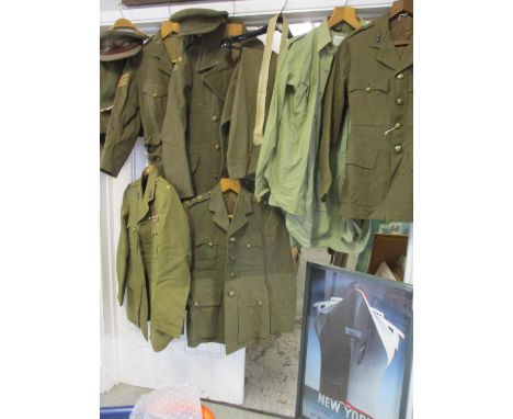 A quantity of WWII and later military clothing A/F to include a 1953 Durigo Manufacturing Company Motor Cyclists pantaloons s