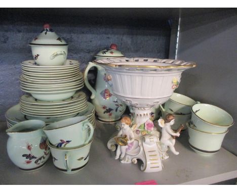 A Staffordshire Lowestoft style tea/coffee service, together with a Ploue Schierholz centre piece 