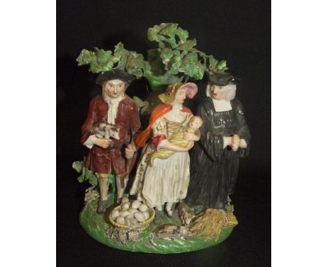 C19th Staffordshire Porcelain Figural Group after Walton, man wearing red jacket holding pig, lady wearing bonnet &amp; cape 