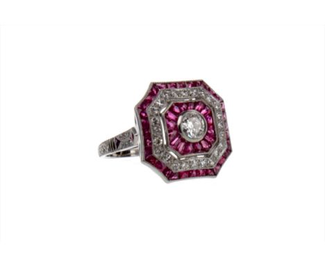 SPINEL, RUBY AND DIAMOND RING, the octagonal bezel set with round brilliant cut diamonds and calibre cut rubies, the diamonds