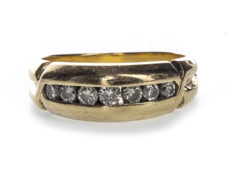 GENTLEMAN'S DIAMOND SET BAND, with a row of round brilliant cut diamonds totalling approximately 0.70 carats, marked 14K, siz