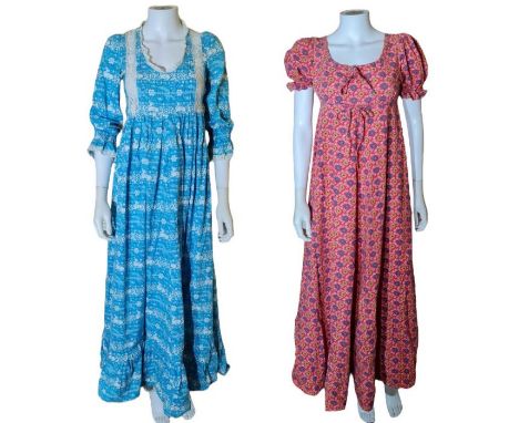 2 early Laura Ashley dresses, Dyers & Printers label. The first C1969 with Heraldic print in turquoise (marked 10, fits moder