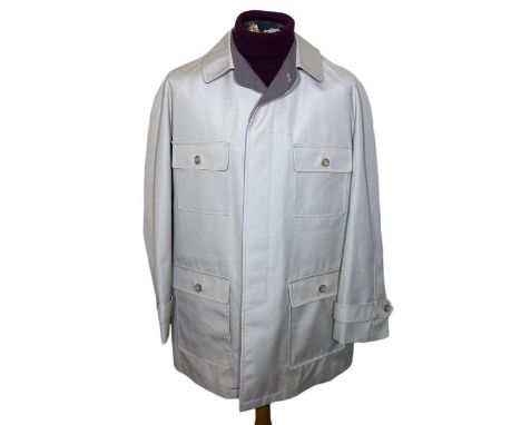 1970s Hardy Amies 3/4 length coat with safari style patch pockets, wool lined for warmth, and a 1970s sweater that looks like