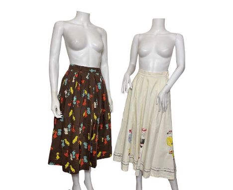 Two 1950s cotton novelty print skirts, one full circle with a Polynesian style print, and another with a brightly coloured do