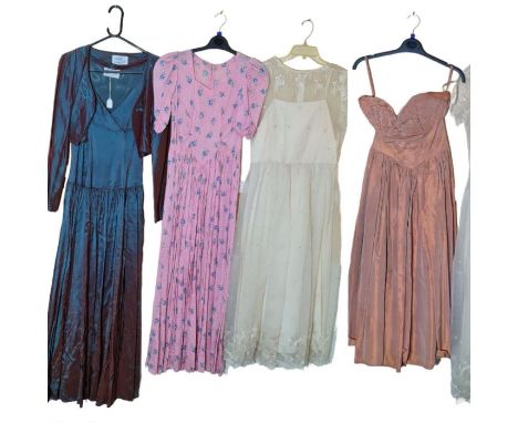 vintage evening wear to include a 1940s swiss dot lawn gown with blue floral print, a 1940s blush pink gown with heavily sout