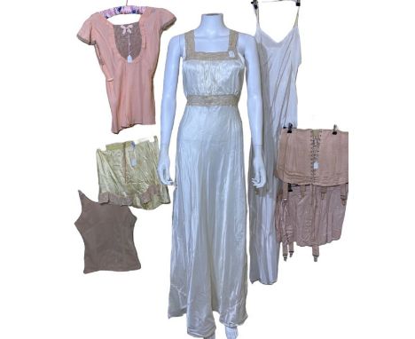 Vintage lingerie to include lemon tap pants, two girdles, a 1930s pyjama top, a shapewear bodice, 30s/40s nightgowns and a fu