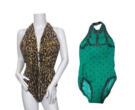 Two 1950s stage costumes (swimsuit/ leotard style) to include lace and zip front, backless, faux leopard fur swimsuit, and a 