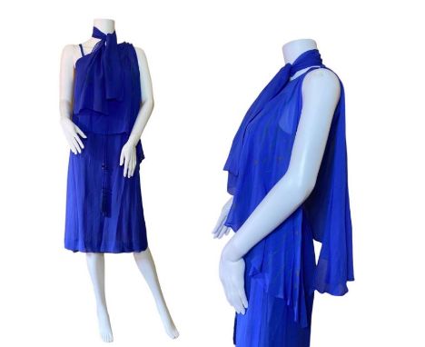 A blue chiffon Norman Hartnell dress C1970s. This comes with a screen printed neck scarf and a beaded lariat belt or necklace