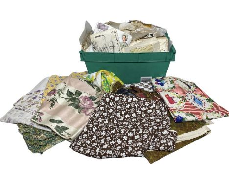 A large box of vintage dress making patterns and fabric yardage. Patterns are mostly 30s-50s and complete, some later. (qty)