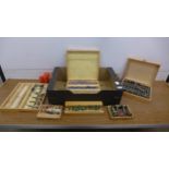 A large quantity of wooden cased router bit sets including Axminster, Trend and Dewalt, etc.