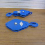 An "Ace" 100mm dia snatch pully block and an "Ace" 125mm pulley block, both unused