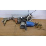 A vintage GW Lowe electric planer, a Toshiba 110v angle grinder and 2 vintage drills (the planer,