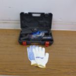 A 'Dayplus' cordless chainsaw, unused