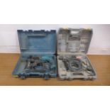 A Ryobi ERH-650V, 230V hammer drill in case and a Makita HR2470, 230V rotary hammer drill in case
