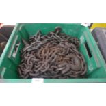 A box of heavy duty steel chains and hooks
