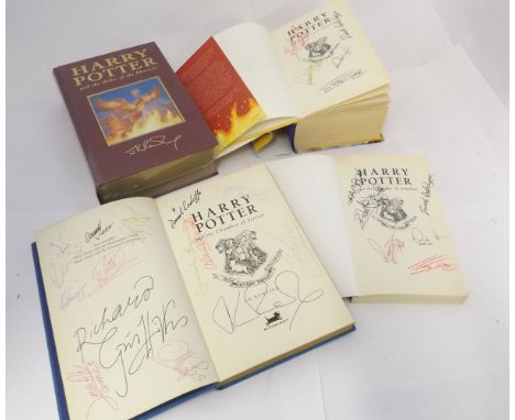 J K ROWLING: 4 titles: HARRY POTTER AND THE PRISONER OF AZKABAN, 1999 1st paperback edition, signed "Daniel Radcliffe" [Harry