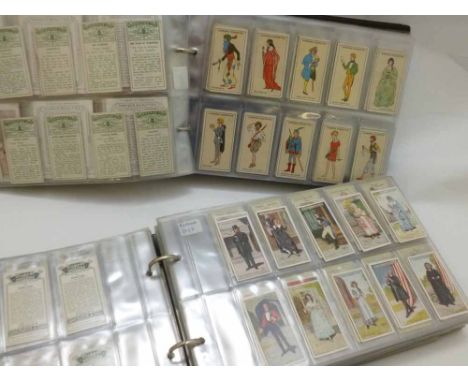 Two albums containing good quantity cigarette card sets including John Player PLAYERS PAST AND PRESENT, 1916, GILBERT & SULLI
