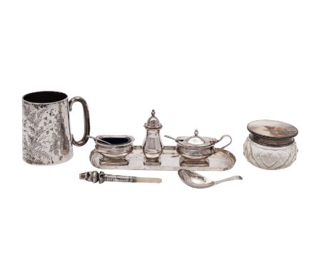 A group of silver items to include;- a silver and glass dressing table jar with hand painted panel of highland cattle drinkin