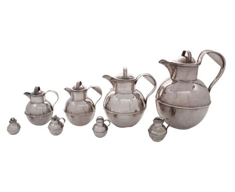 An early 20th century graduated set of five e.p.n.s Guernsey milk cans retailed by Bachmann &amp; Co, the largest 2 1/2 pts, 