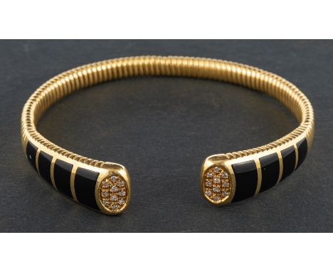 An Italian, onyx and single-cut diamond bangle, of 'gas pipe' design, with Italian control marks for 18ct gold, estimated dia
