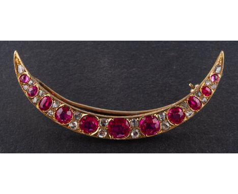A synthetic ruby and rose-cut diamond crescent brooch, total estimated diamond weight ca. 0.35ct, total length ca. 6cm, total