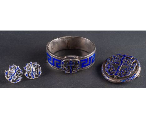 A suite of openwork and blue enamel jewellery, including a hinged bangle with Greek key pattern decoration, inner 5.5cm; a br