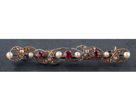 A round, mixed-cut ruby, seed pearl and rose-cut diamond brooch, total estimated diamond weight ca. 0.15ct, total length ca. 