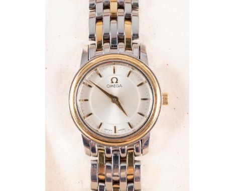 Omega, a lady's  stainless-steel and gold-plated wrist watch the round silvered dial with raised baton numeral and hands, and