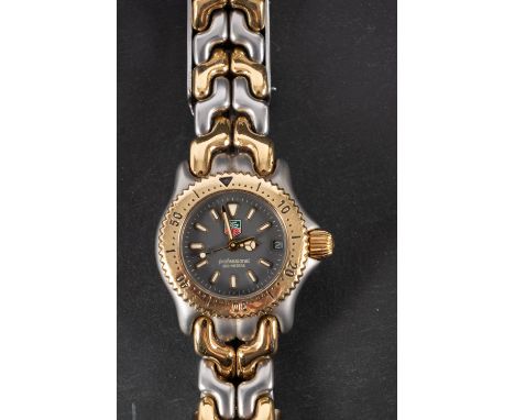 Tag Heuer a lady's  stainless-steel wristwatch the grey dial with luminous 'Mercedes' hands, sweep seconds hand, date apertur