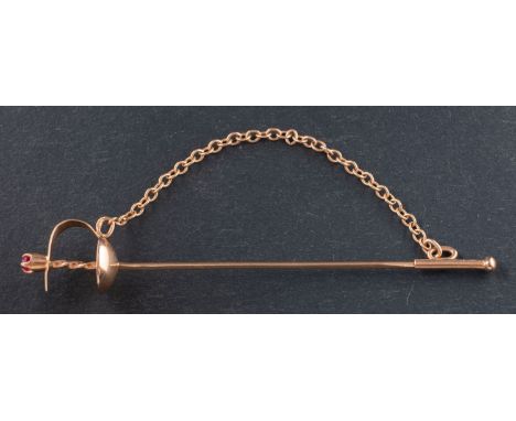 A Soviet, sword tiepin, with a synthetic ruby to finial and Soviet control stamps for 14ct gold, total length ca. 7cm, total 