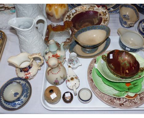 An 18th century Worcester style tea bowl and saucer with blue and white transfer chinoiserie decoration (hairline crack to ba