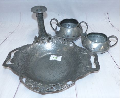 A Liberty's Art Nouveau pewter fruit dish with pierced clover leaf border, No. 0287; an 'English Pewter' milk and sugar; a ca