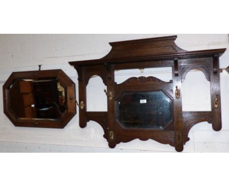 An Edwardian oak mirror back hall rack; a firescreen