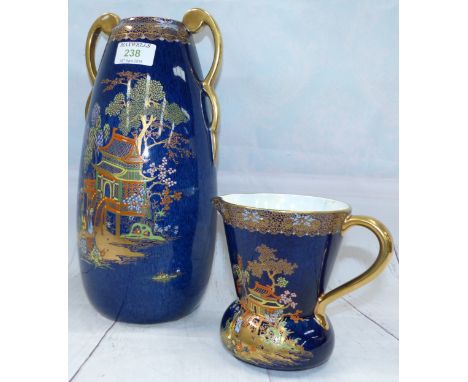 A Carltonware ovoid vase, blue ground with chinoiserie decoration, height 12½" (a.f.); a similar jug (hairline cracks)