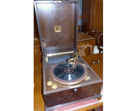 An HMV Model 461 Table Grand wind up 78 rpm record player with gold plated fittings, in oak veneered case