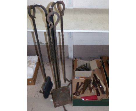 A large wrought iron companion stand; various vintage tools; a set of stair carpet grips