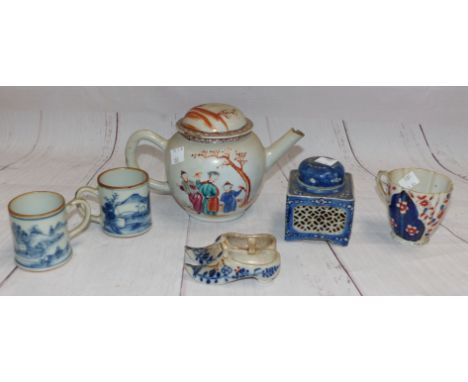 An 18th/19th century Chinese porcelain famille rose teapot (finial missing, spout chipped); 2 miniature blue and white cups (