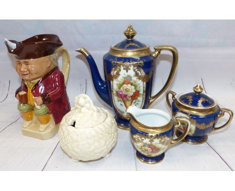 A Clarice Cliff preserves pot; a Noritake porcelain 3 piece coffee service; a Toby jug by Wood & Sons
