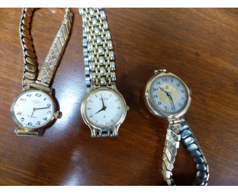A Rotary lady's 9 carat agold cased wristwatch; another lady's gold cased wristwatch with Swiss movement and an Accurist wris
