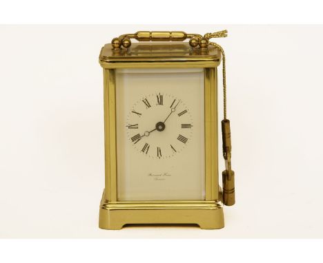 A brass carriage clock, 11cm high