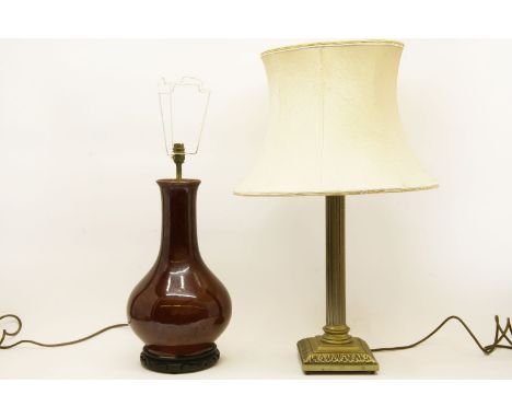 A modern Chinese sang de boeuf style lamp, together with a brass fluted column lampbase