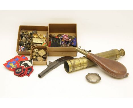 A brass four section telescope, together with a leather powder flask, a pocket flintlock pistol and a collection of medals