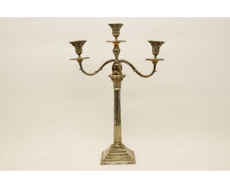 A silver plated three branch candelabra, with Corinthian column stem, 66cm high