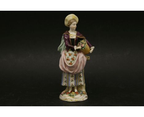 A 19th century Capodimonte figure of a flower seller, in traditional costume, 16cm high (incomplete cloak)