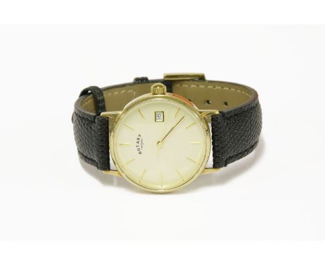 A gentlaman's 9ct gold Rotary quartz strap watch, with baton numerals on a black leather lizard effect strap, with box and pa