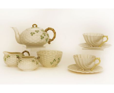 Belleek items to include: teapot, bowl, sugar bowl, cream jug, two cups and saucers