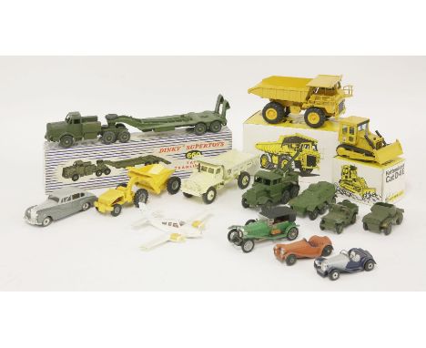 A quantity of toys, a Dinky 660 tank transporter, boxed, a CAT 796C, and other loose unboxed toys