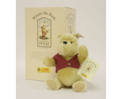 A limited edition Winnie the Pooh Steiff bear, complete with labels, boxed