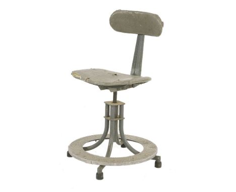 An industrial stool by Leabank,on a revolving stand with a footplate